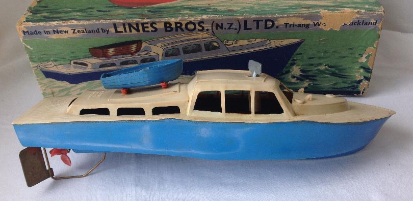 boxed circa 1950's New Zealand made Lines Brothers Triang clockwork wind up Penguin Cabin Cruiser boat toy